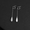 style: Silver ear clip