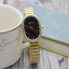 color: Gold/Black