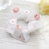 Color: White with pink flowers
