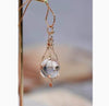 Color: Netted crystal pendant
