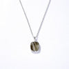 Color: Silver elongated stone