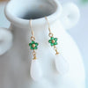 style: White magnolia green zircon