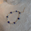 Color: Faceted cyan gold pearl